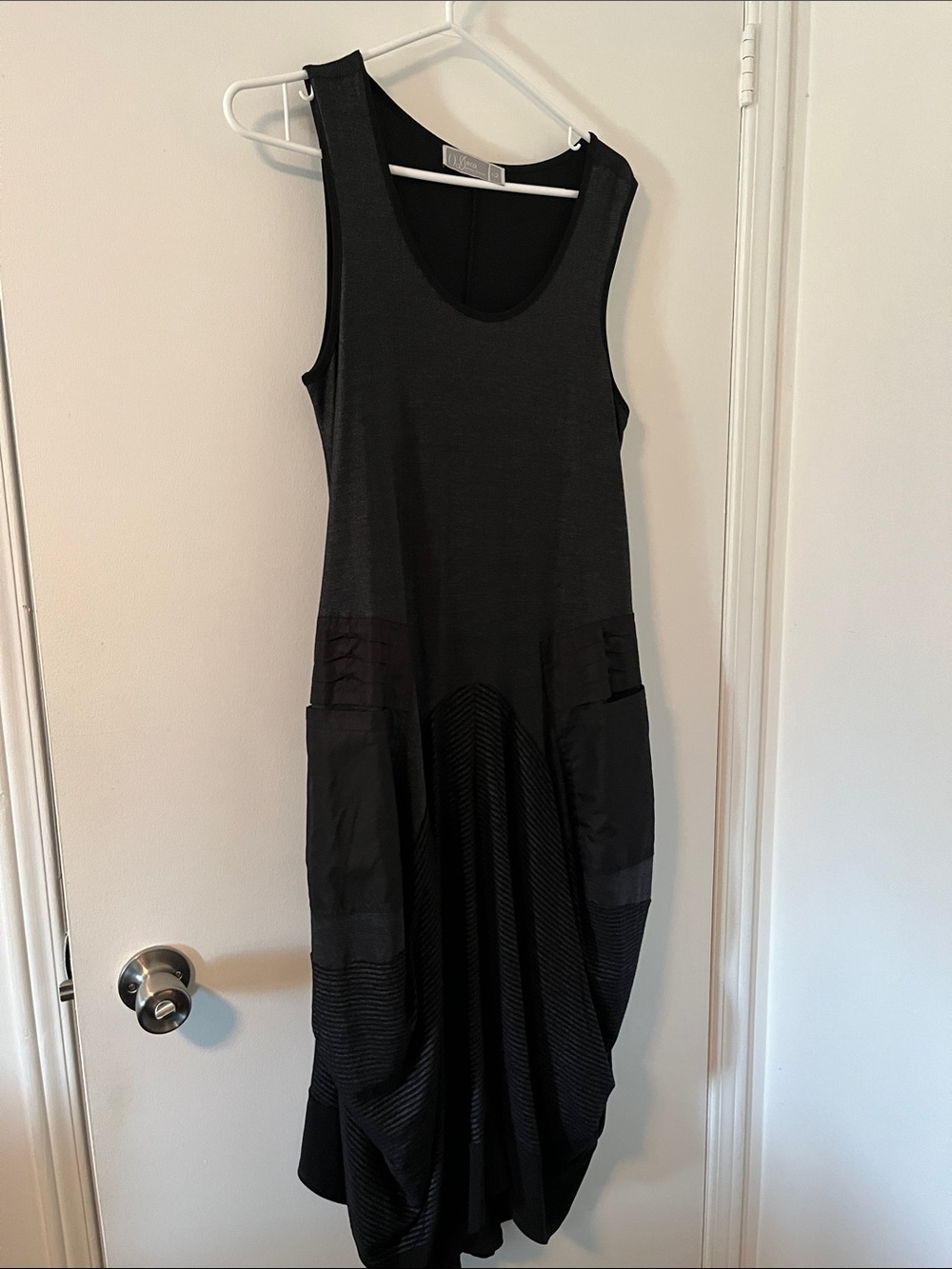 Black Sleeveless Swing Dress with Pocket Detail